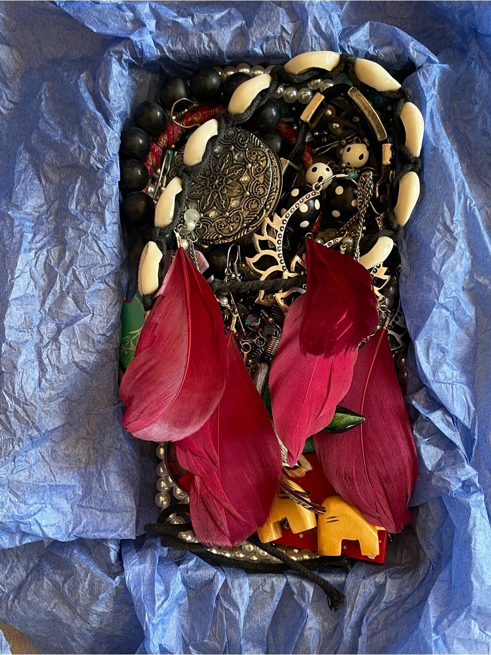 Lot of mix fashion jewelry in winter themed tin box .